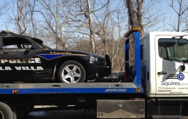 Squires Services towing police car